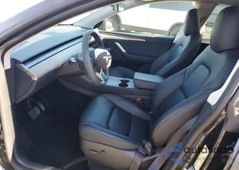 2024 Tesla Model Y from USA, damaged, VIN 7SAYGDED7RF039848